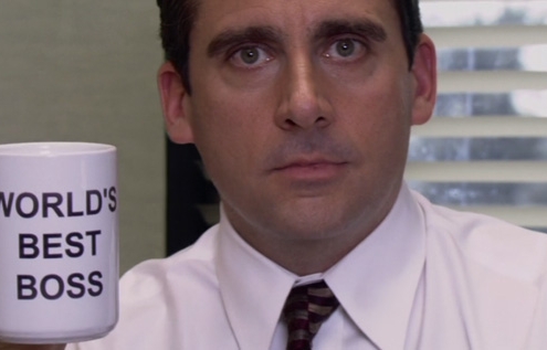 Boss with a mug written world's best boss - business development with mobile applications